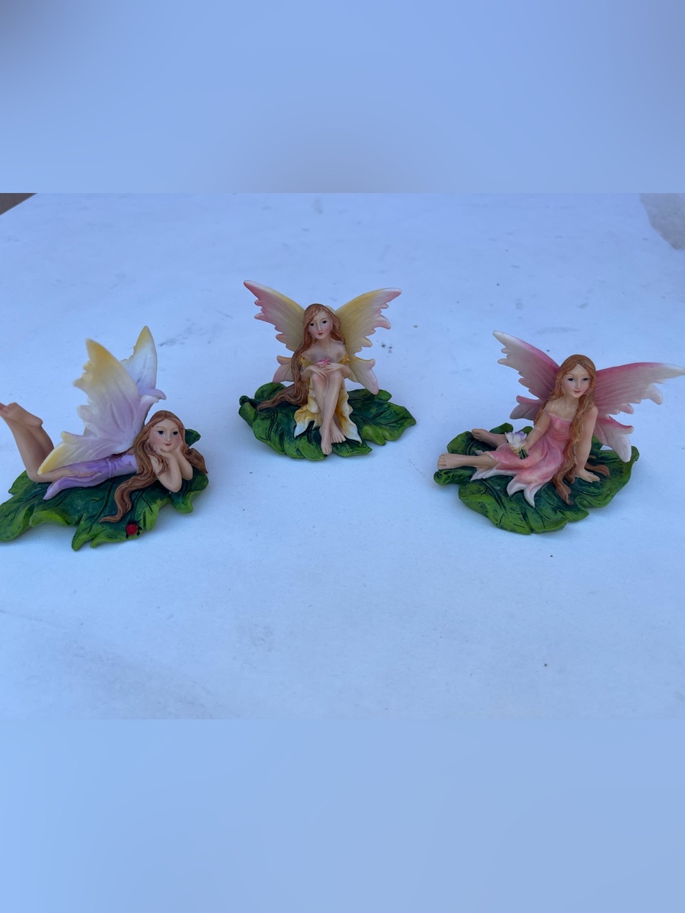 Pink and Yellow Fairy Figurine on Green Leaf - Decorative Home Party Accent